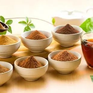 Preparation of Instant Green Tea from Tea Dust Using an Ultrasonic Extraction Process