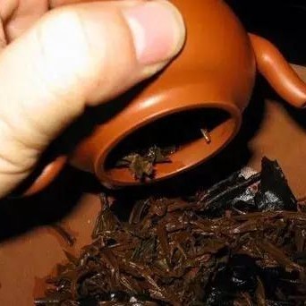 How to Clean and Remove Tea Stains from a Purple Clay Teapot?