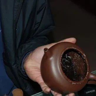 What to do if tea stains in the Purple Clay Teapot won-t wash off?