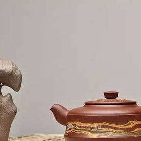 How should one evaluate the "function" of a Yixing clay teapot upon receiving it?