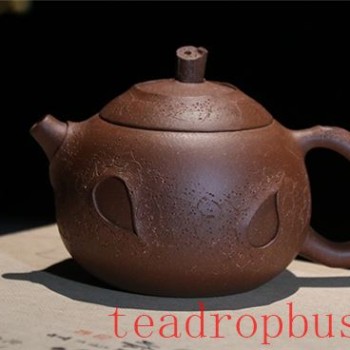 Can you judge the firing temperature of a purple clay teapot from its sound?