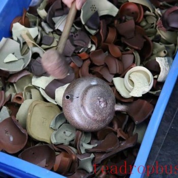 Can a broken Yixing clay teapot be ground into powder and remade into clay?