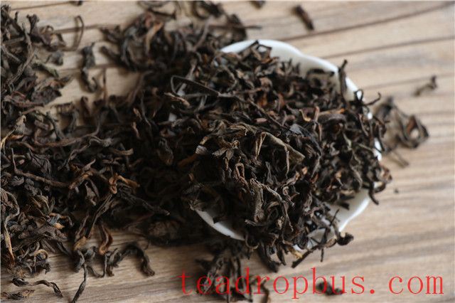 What are the characteristics of wet-warehouse tea, and how does it differ from dry-warehouse tea?-1