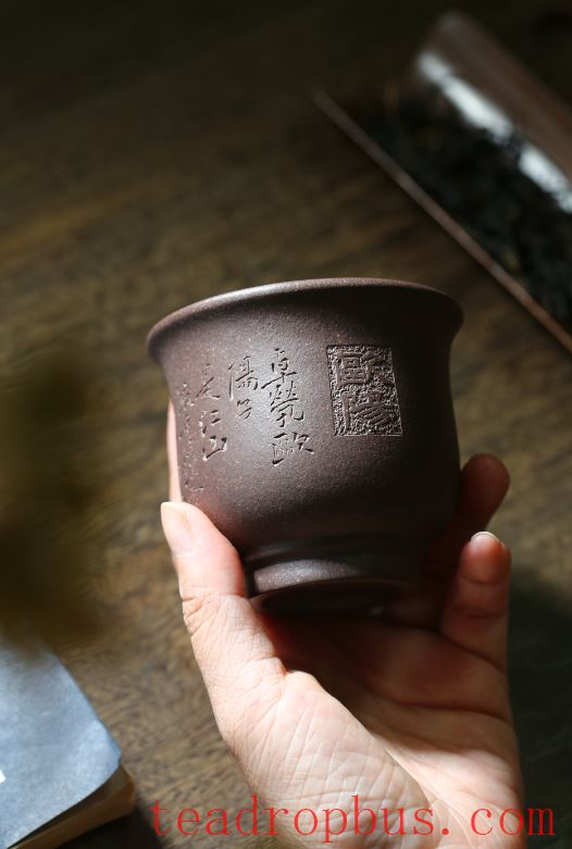 What type of host cup complements a purple clay teapot?-6