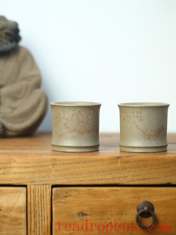 What type of host cup complements a purple clay teapot?-1